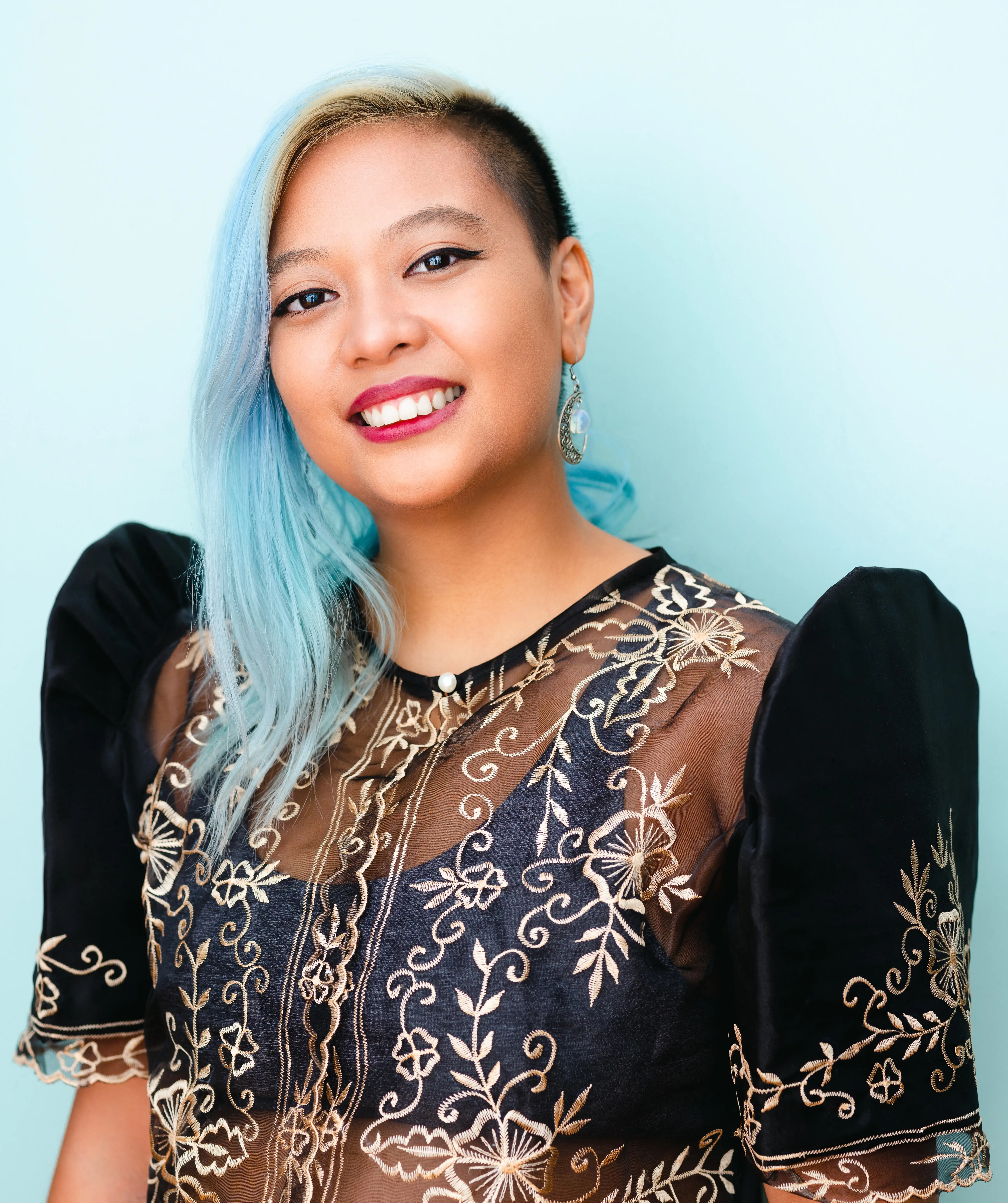 A headshot of Mars Juno Bartolome Neri, artist and stage manager.